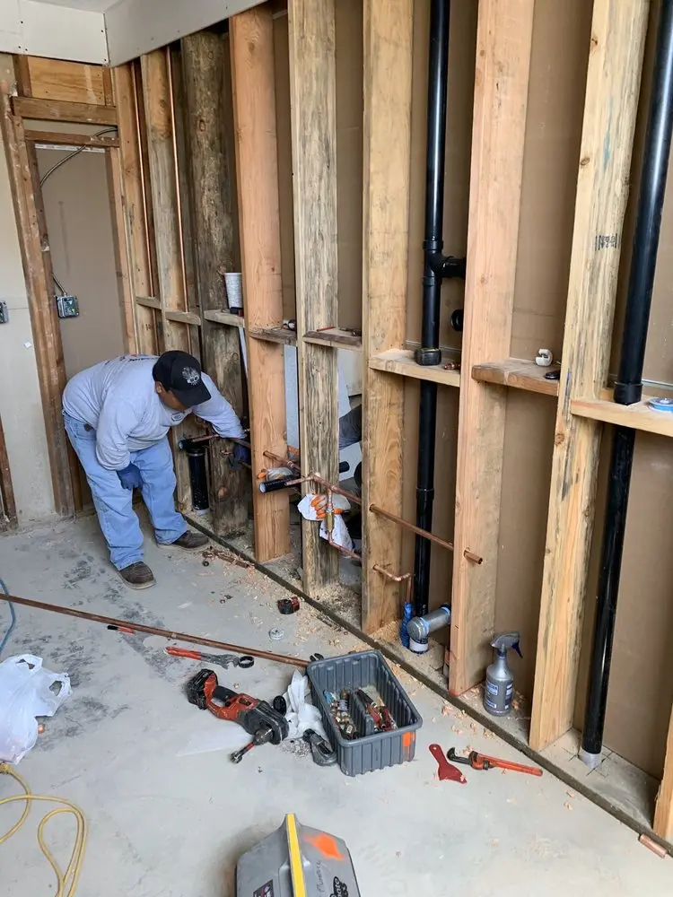 Commercial rough-in plumbing for Water Heater Replacement in Farmington Orchards